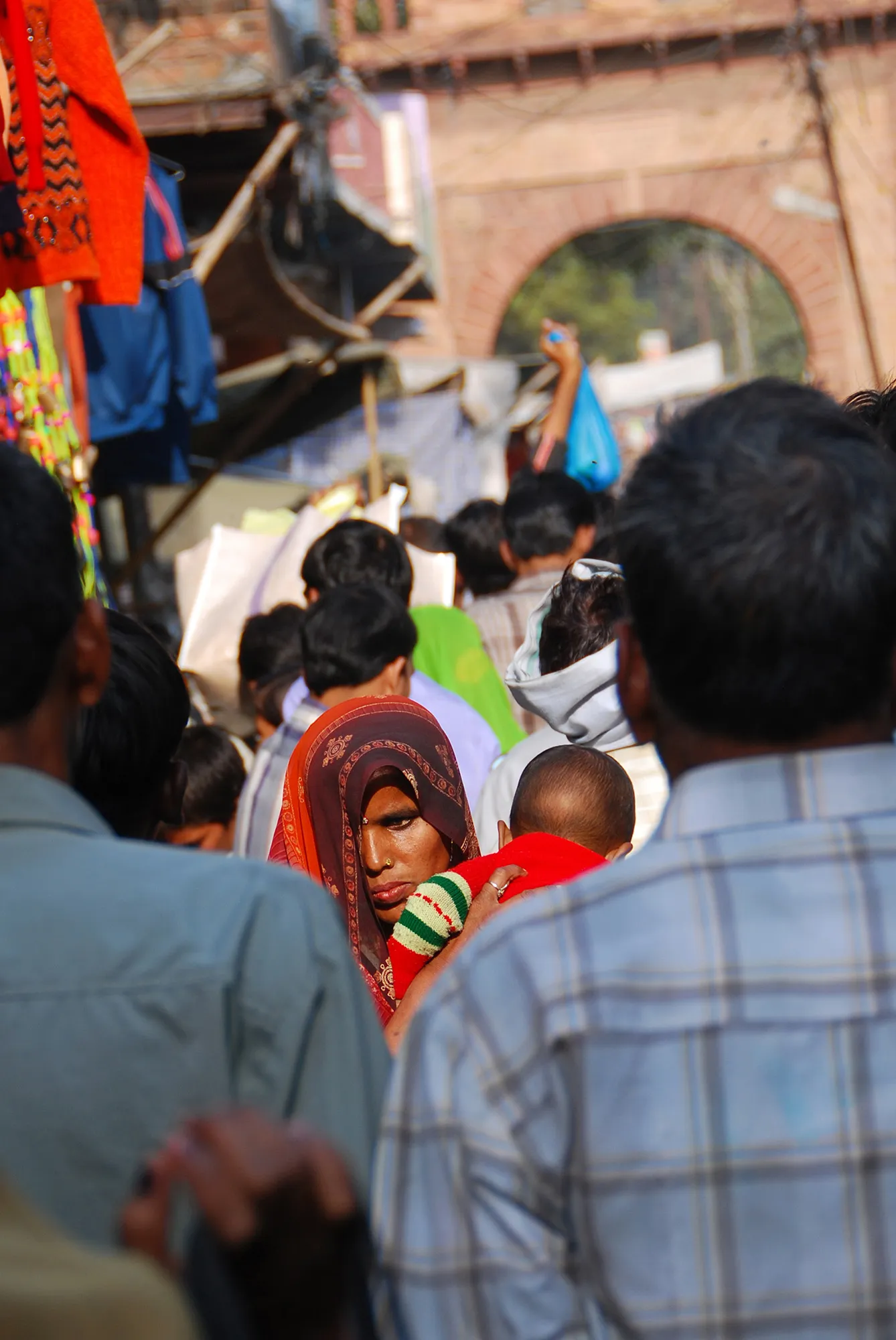 Woman moving through crowded street