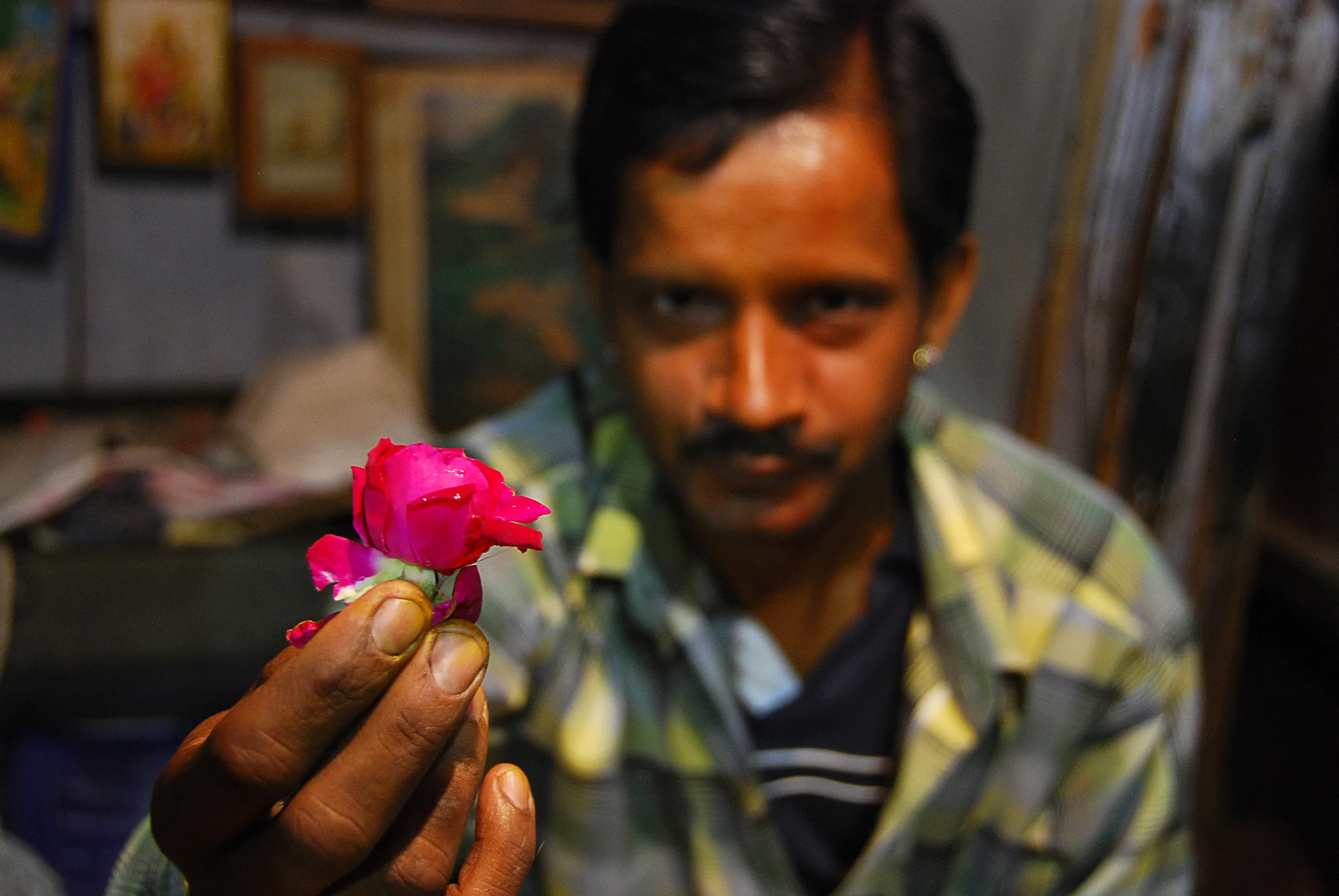 Man handing out flower