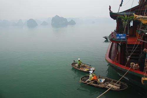 Vendors approach a boat