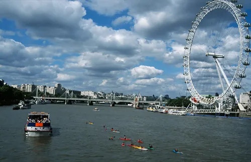 Kayaks on Thames next to London Eye