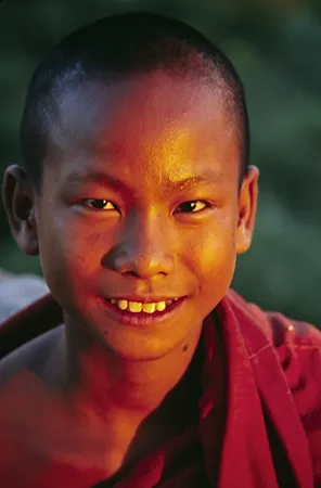 Young monk at sunset