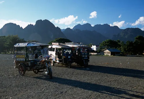Tuk-tuks in Van Vieng